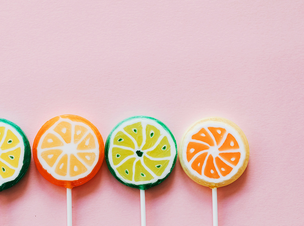 lollipops on pink background